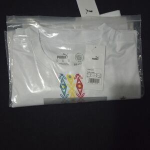 Puma White Tee with Red Yellow and Teal Floral Motif